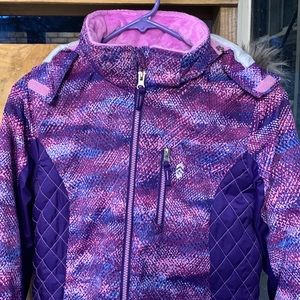 This is a girls, size 14, jacket. This jacket has adjustable sleeves, and a hood